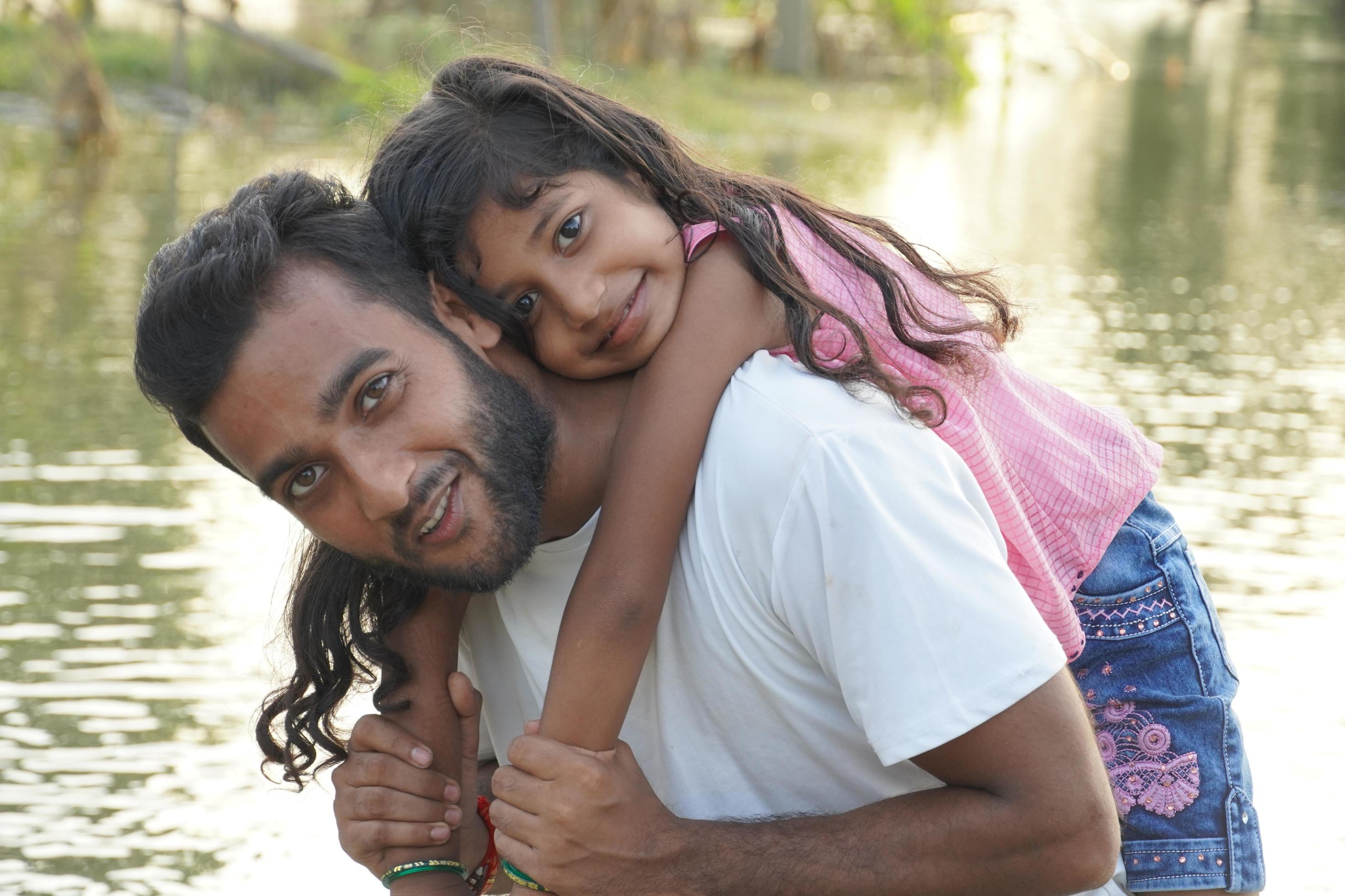 A boy was holding the girl on his shoulder 6918033 Stock Photo at Vecteezy