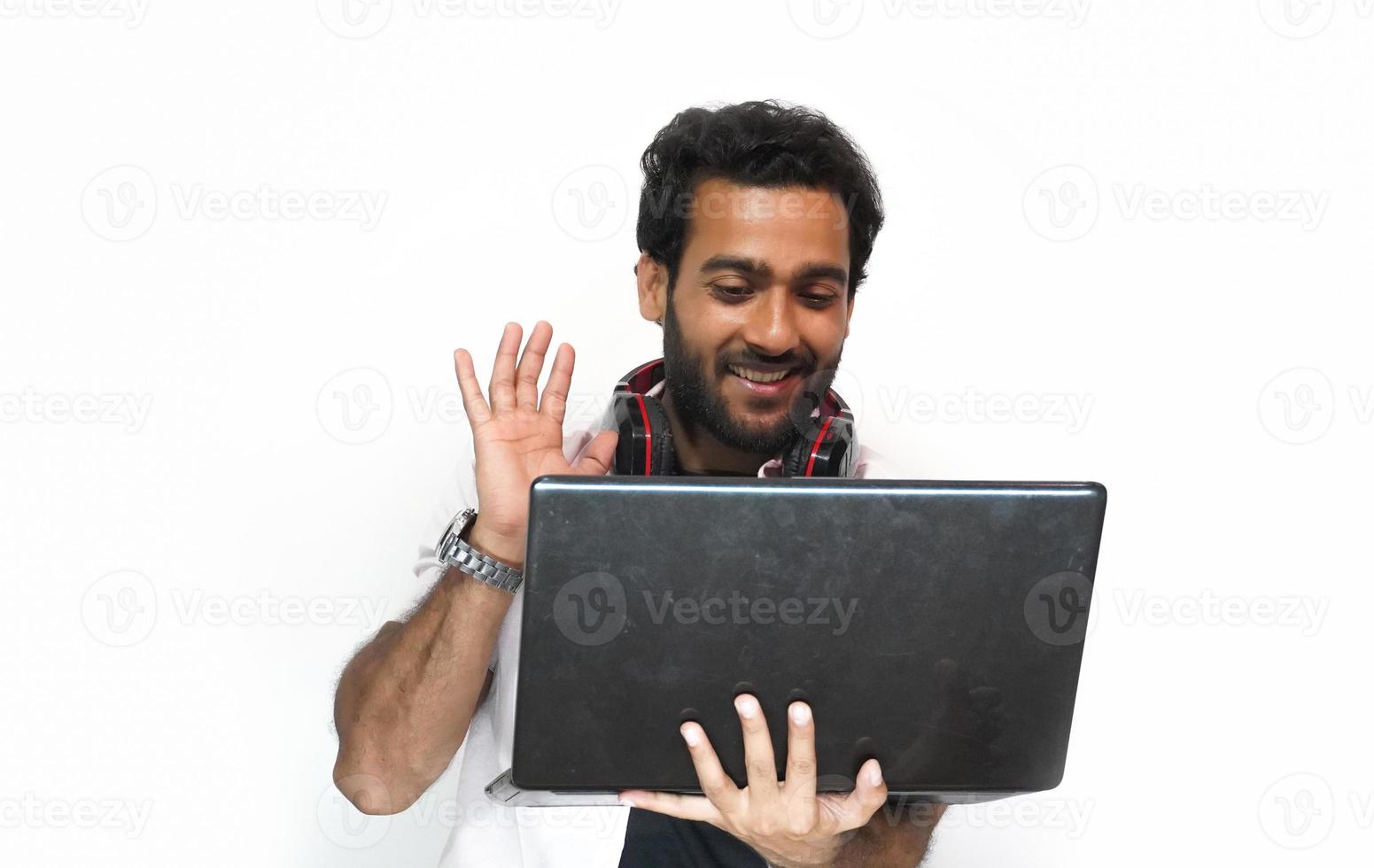 man attending meeting online sayinh hi - business concept photo