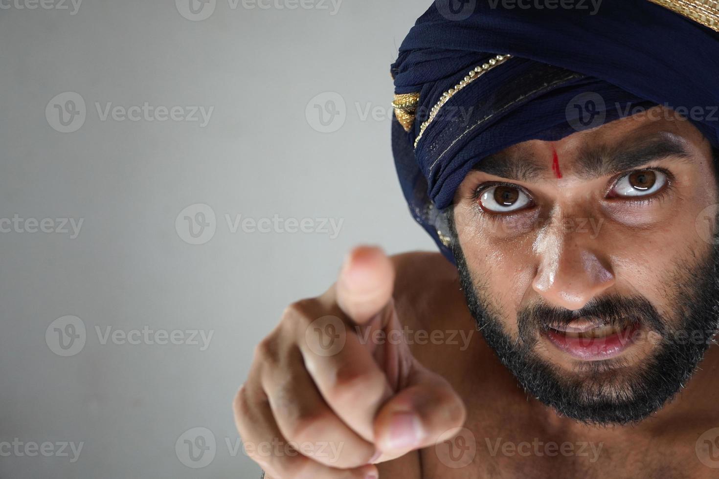 indian King images - indian man in Theater acting as a king photo