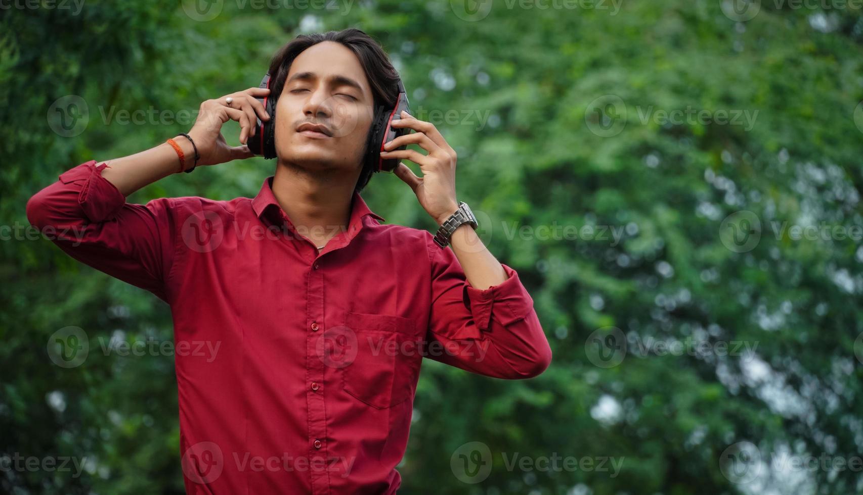 man listening music and enjoying photo