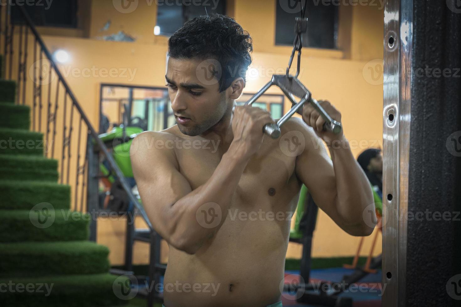 Young man doing gym without clothes gym images photo