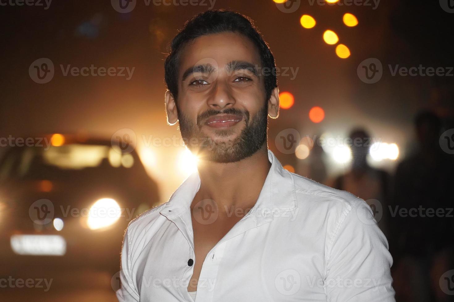 a young man on road outdoor low light photos