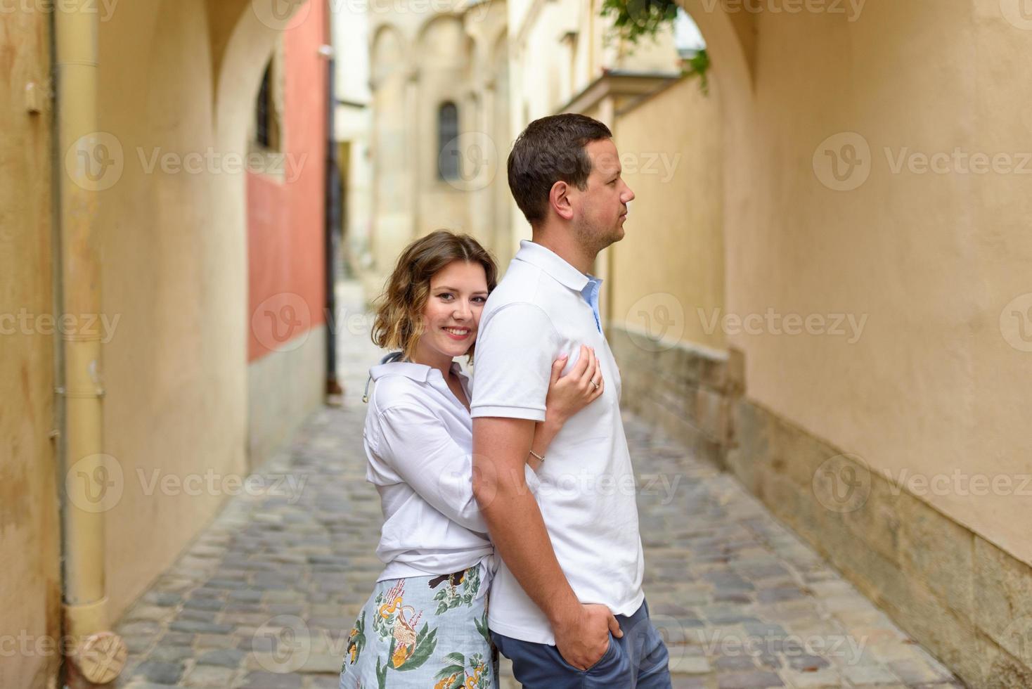 A couple in love on the streets of the old bridge photo