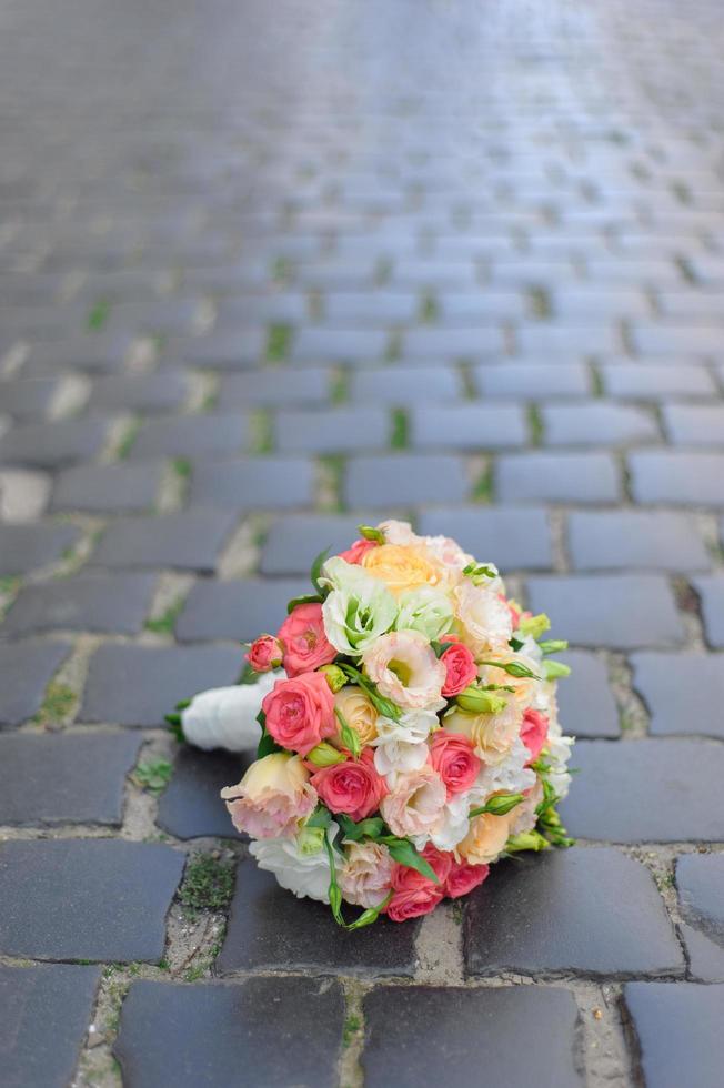 wedding bouquet on the grass photo