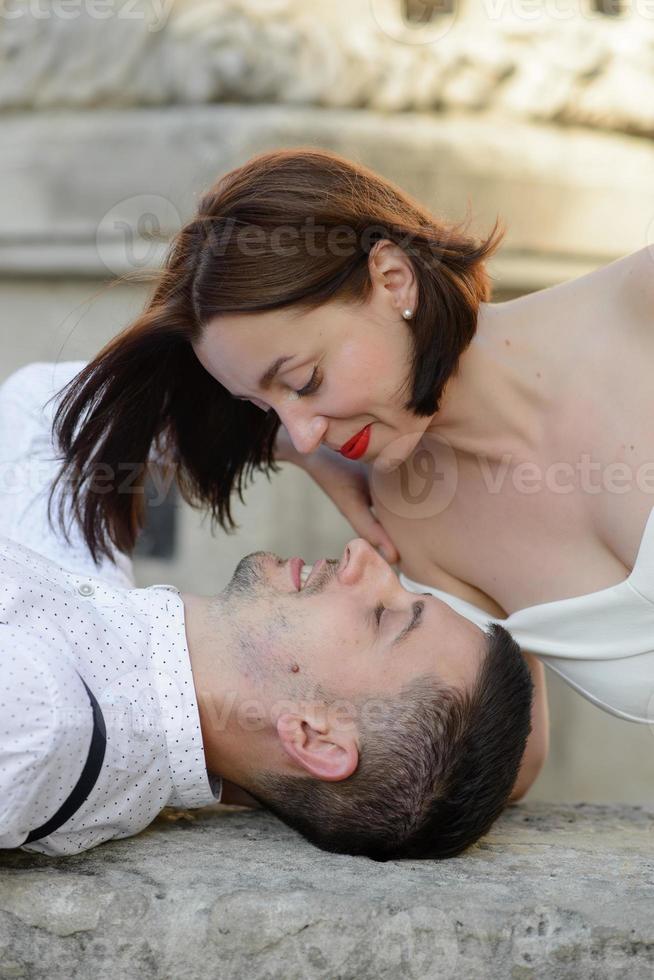 Beautiful stylish couple on a date on the streets in the old city. photo