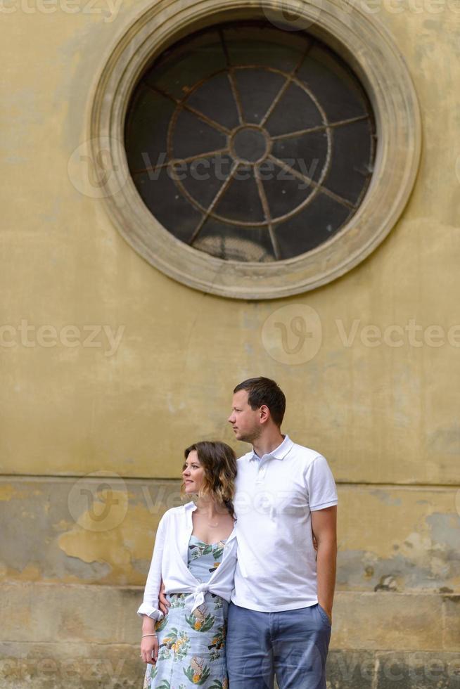A couple in love on the streets of the old bridge photo