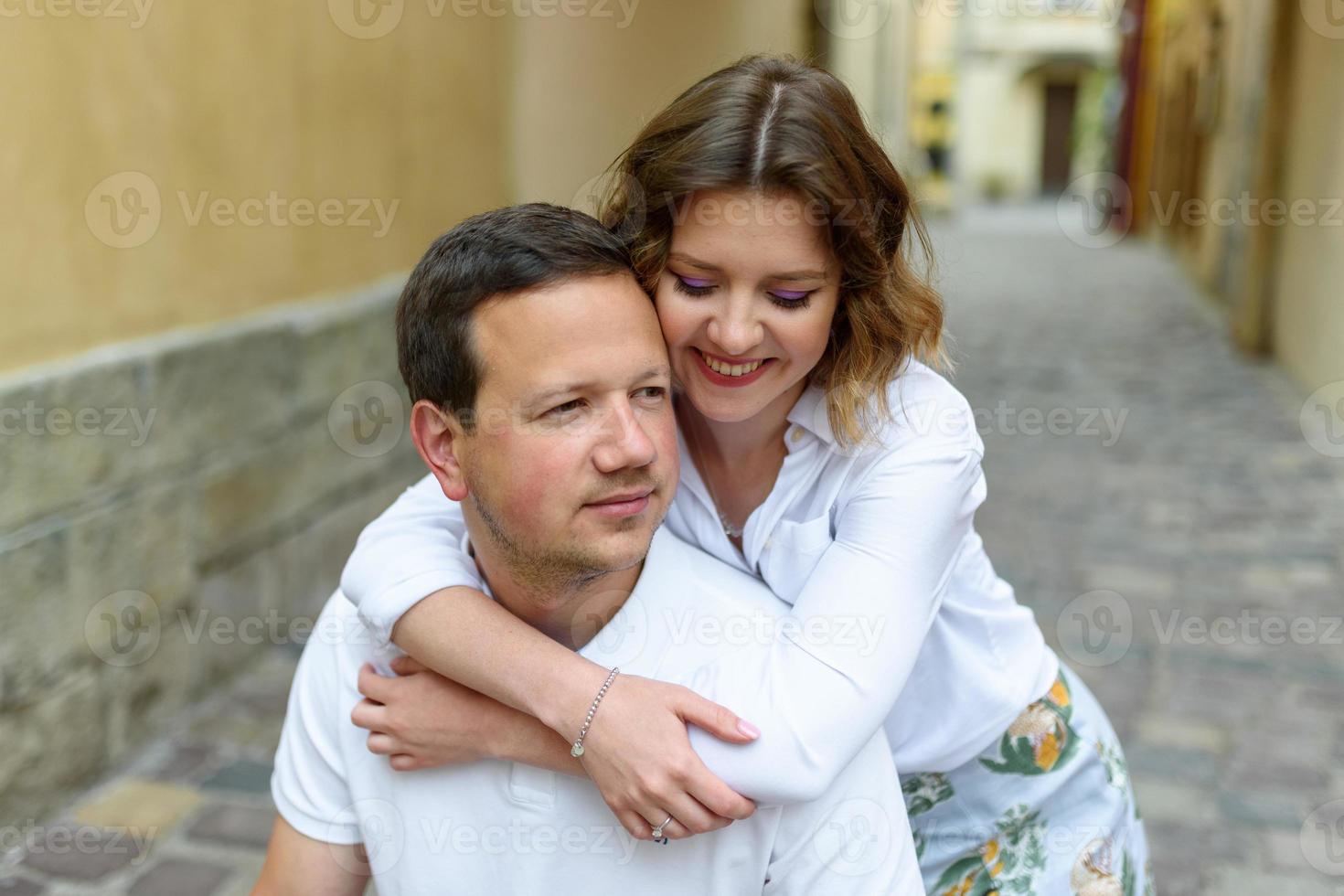 A couple in love on the streets of the old bridge photo