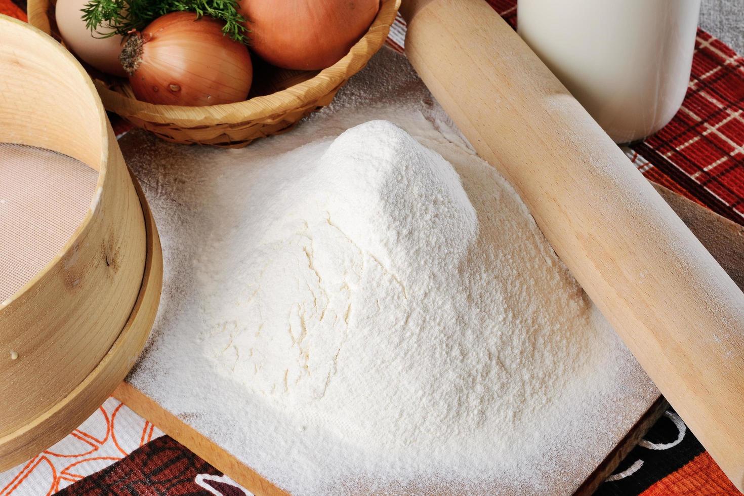 Chicken eggs with slices of bread on the table with milk photo