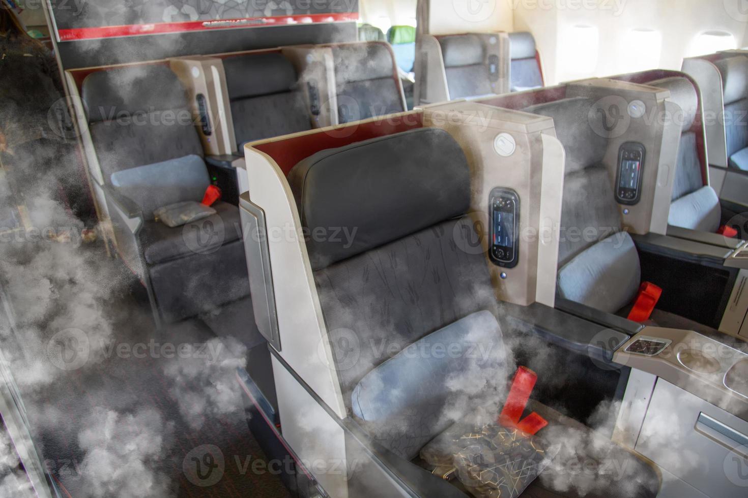 Plane experiencing a catastrophic failure event caused by smoke, burning engine and fire photo