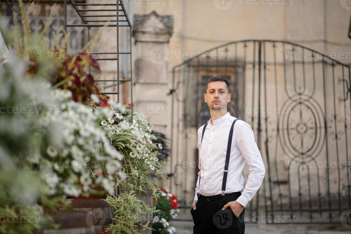 Beautiful stylish couple on a date on the streets in the old city. photo