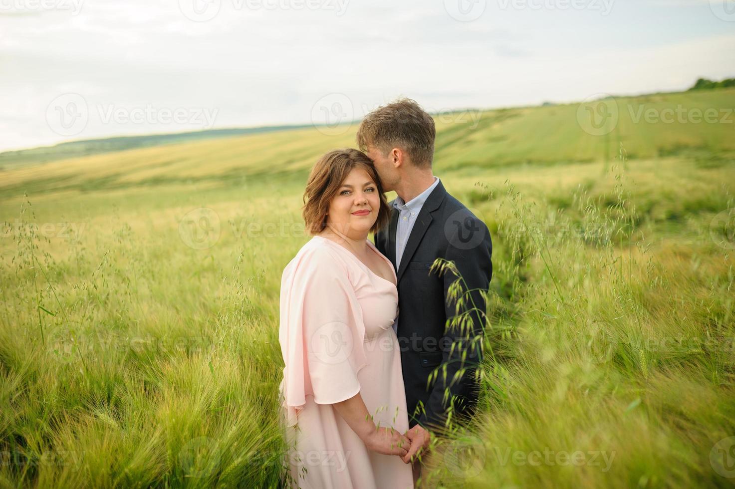 Happy family in the field photo