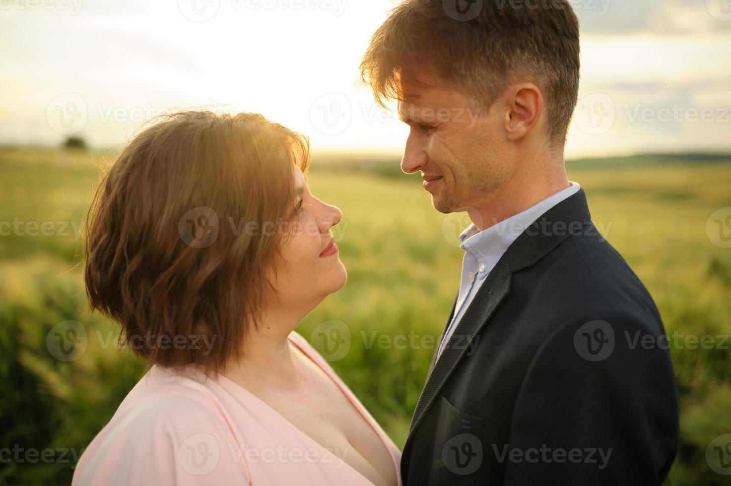 Happy family in the field photo