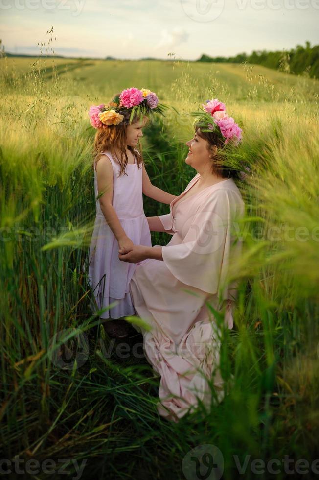 Happy family in the field photo