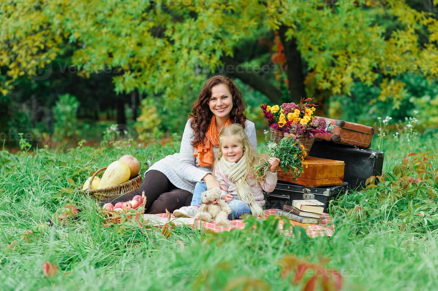 Mom and daughter on a picnic photo