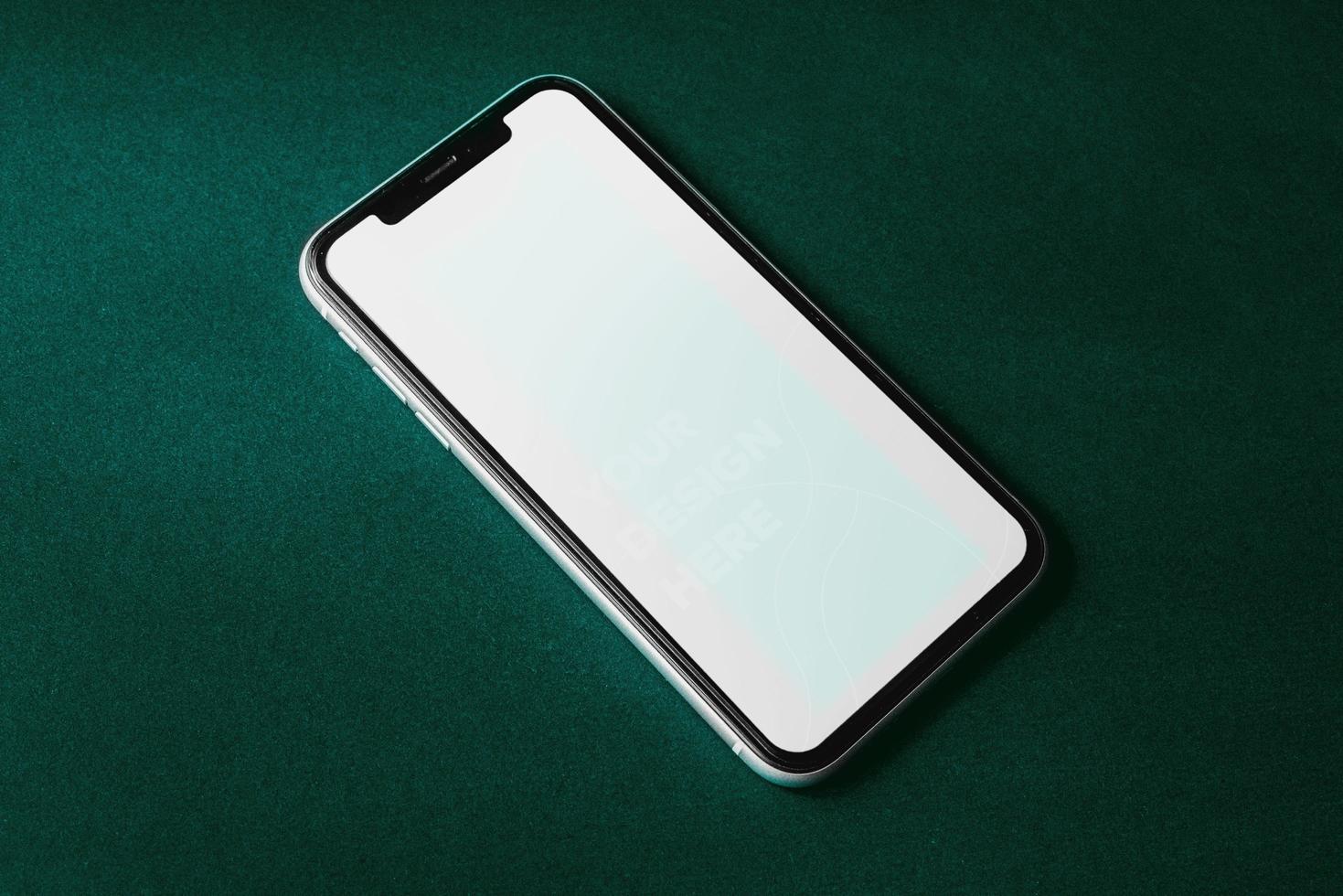 Single smartphone screen mockup above flat paper texture by real photography photo