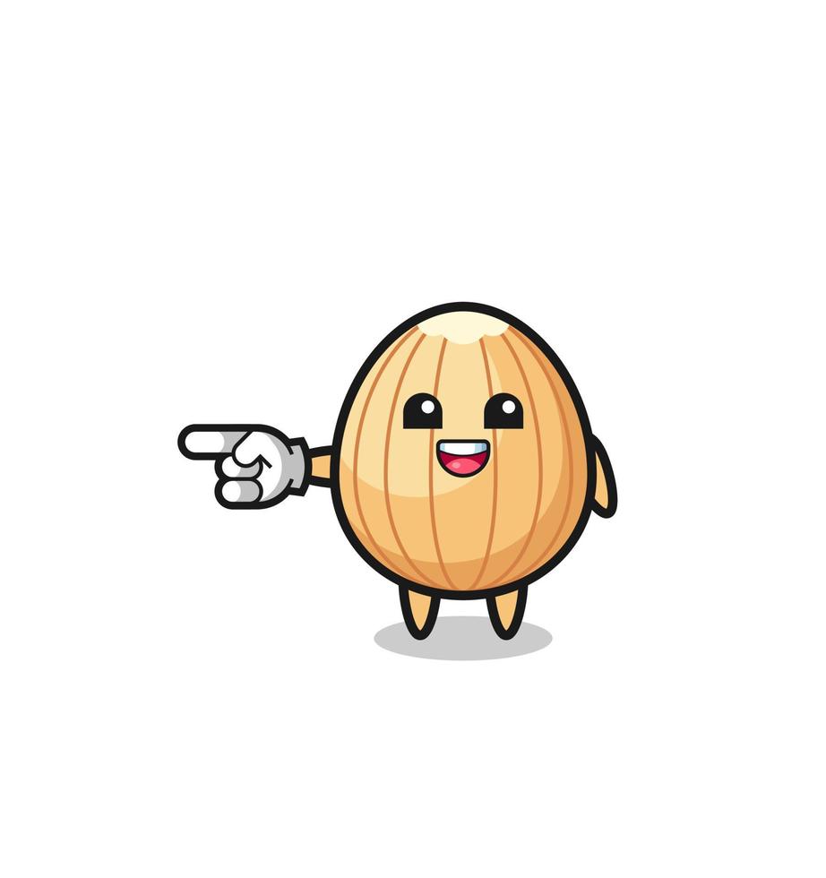 almond cartoon with pointing left gesture vector
