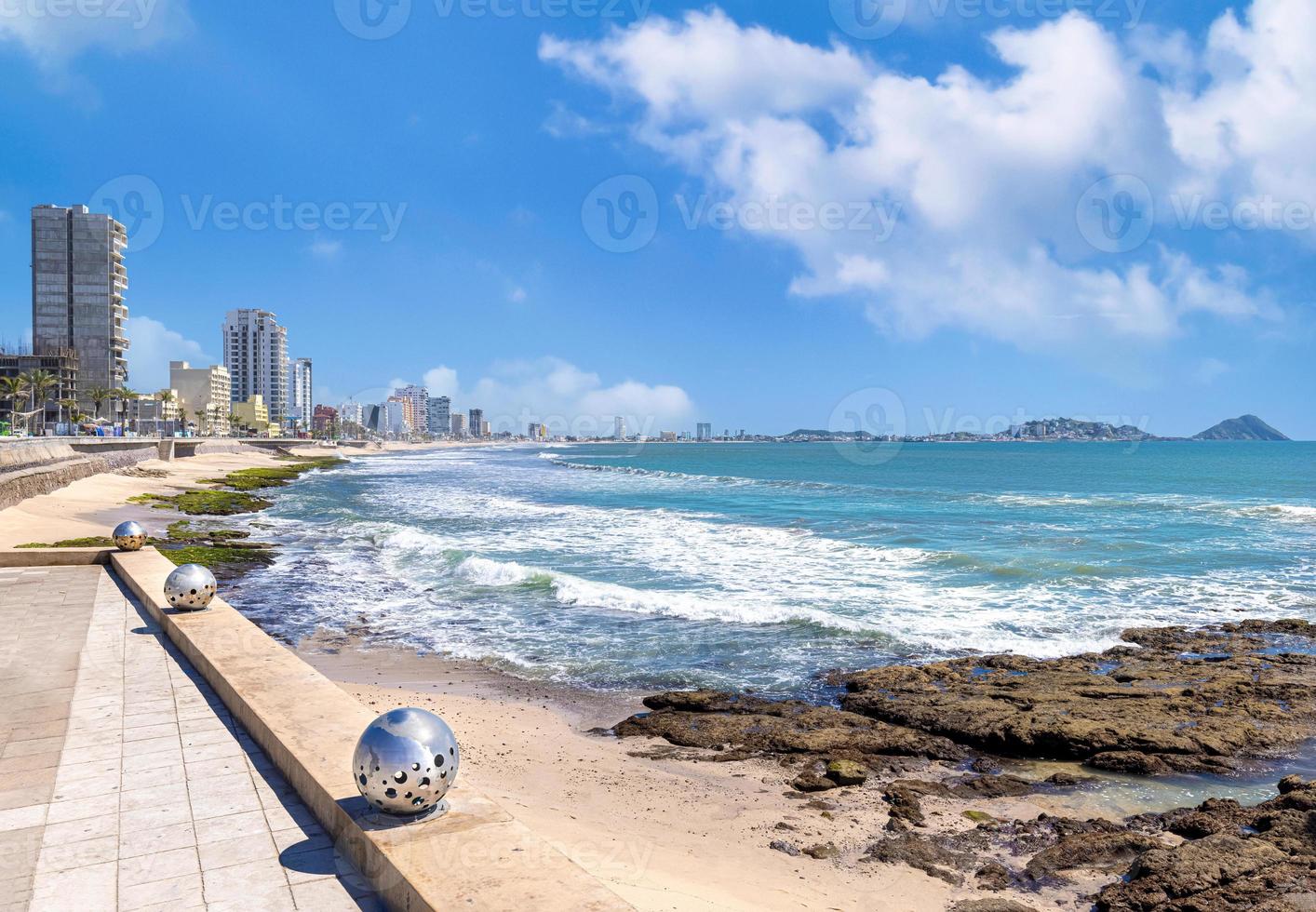 Famous Mazatlan sea promenade, El Malecon, with ocean lookouts, tourist beaches and scenic landscapes. It connects Old Mazatlan with Hotel Zone Zona Hotelera photo