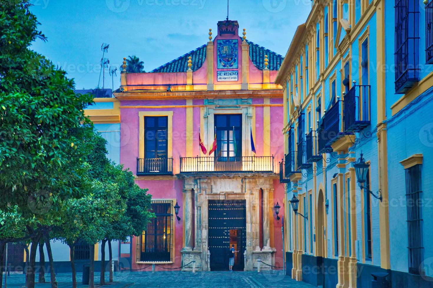 Seville streets at an early sunset in the historic center photo