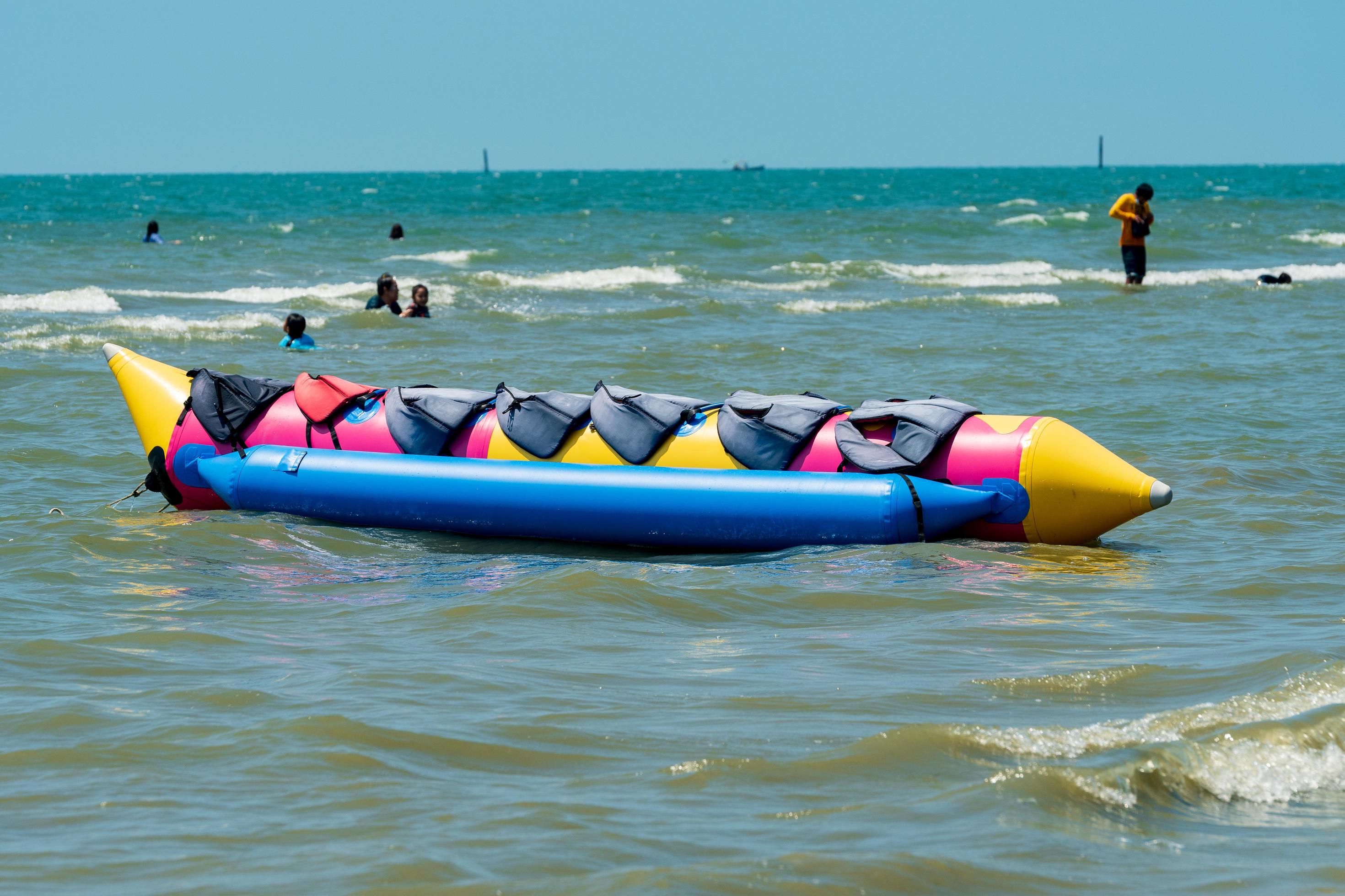 Chonburi, Thailand -06 Mar. 2021 Banana boat floating on Bangsaen beach