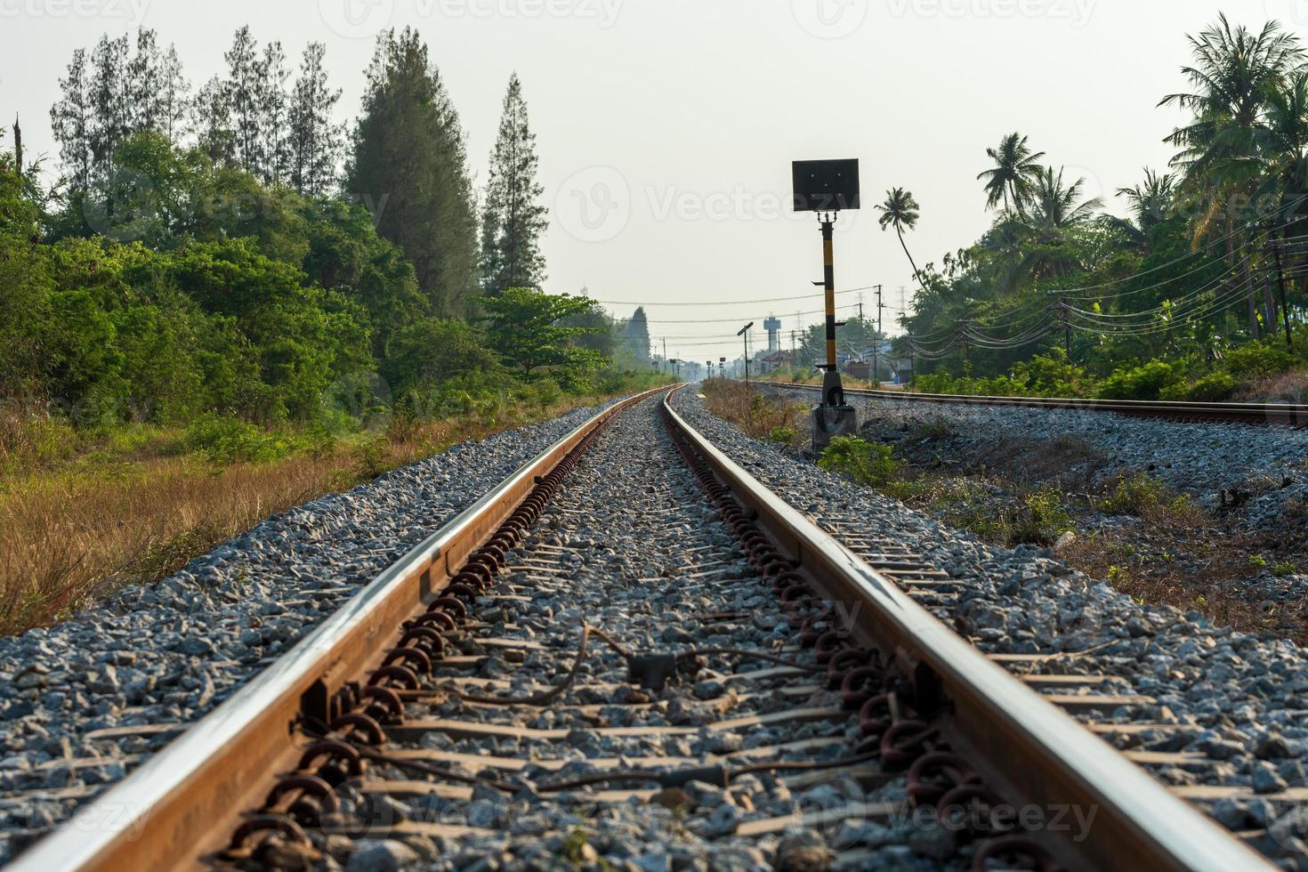 Railway in rural landscape of Thailand photo