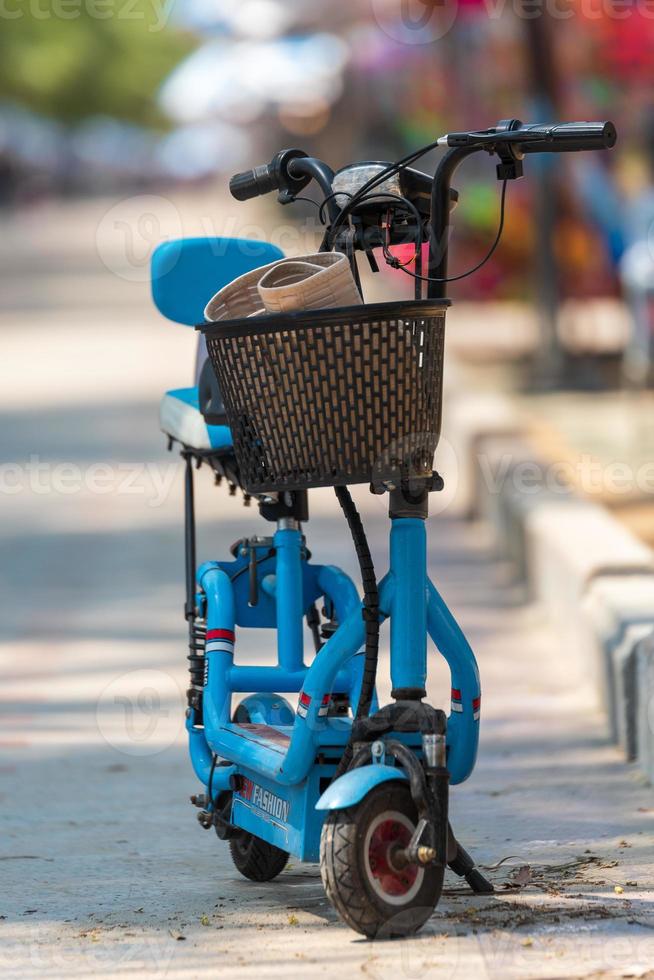 Bicycle parked on the beach photo