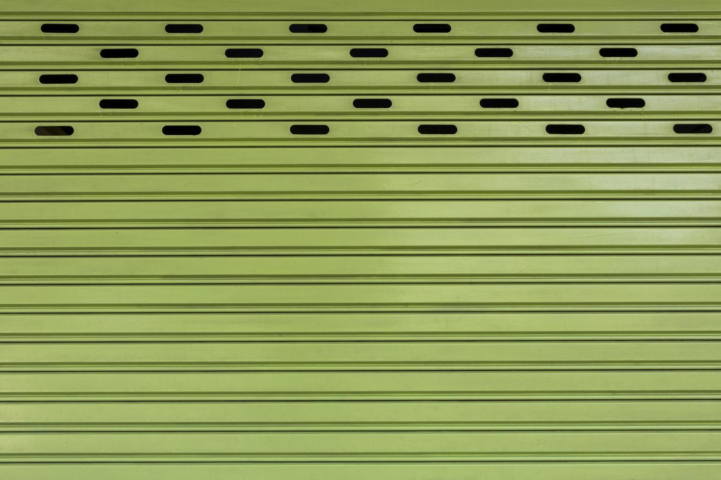 A light green-colored steel wall.,texture background photo