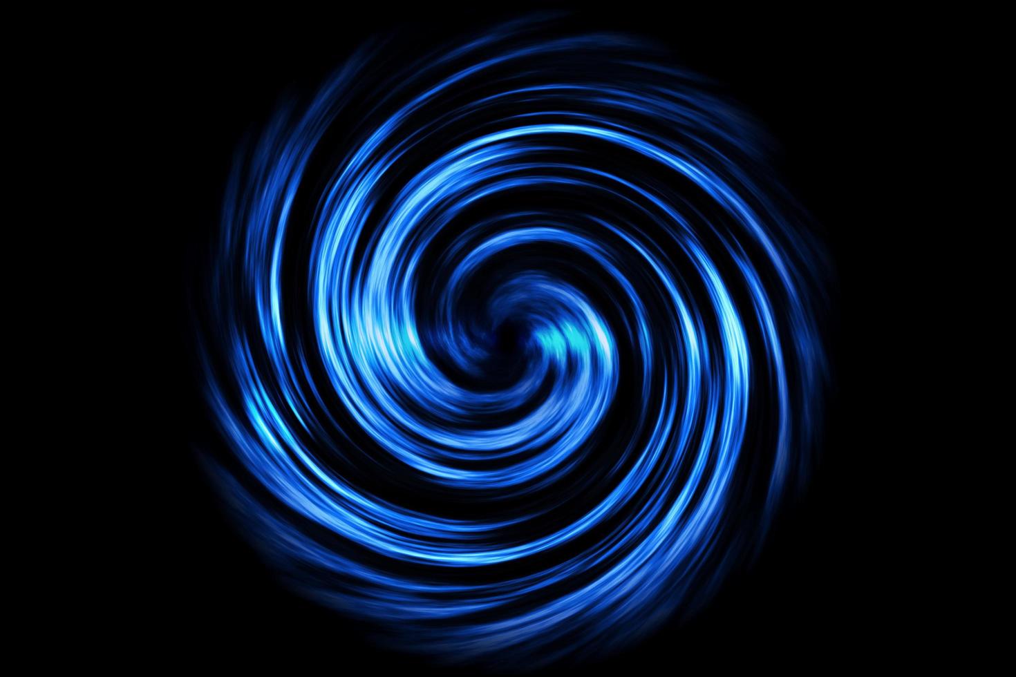 Glowing spiral tunnel with light fog on black background photo