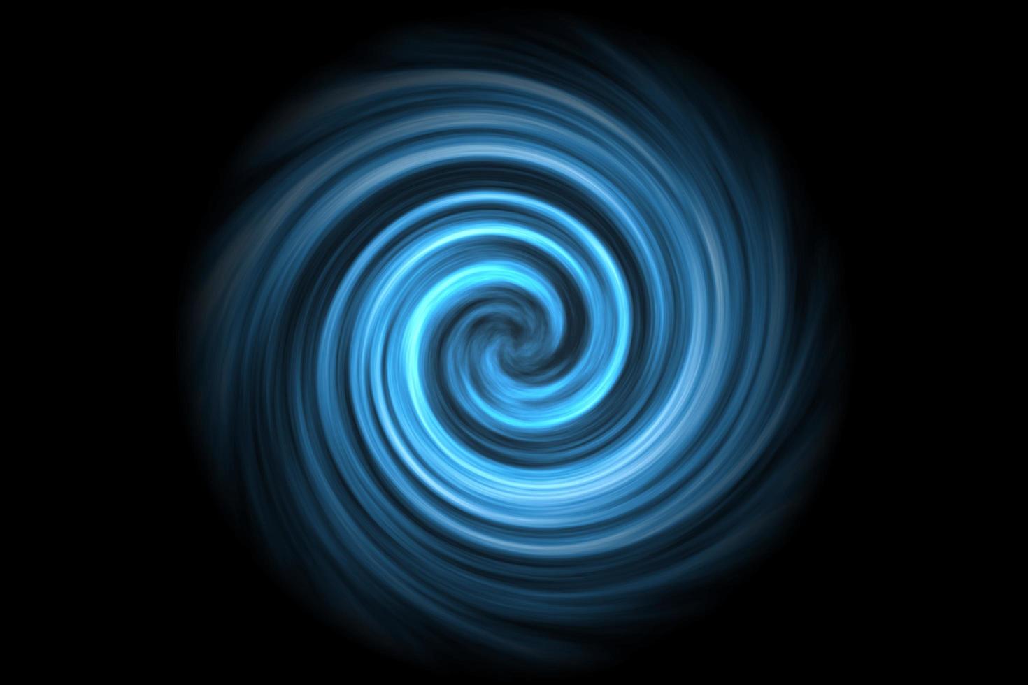 Abstract light blue spiral smoke on black background photo