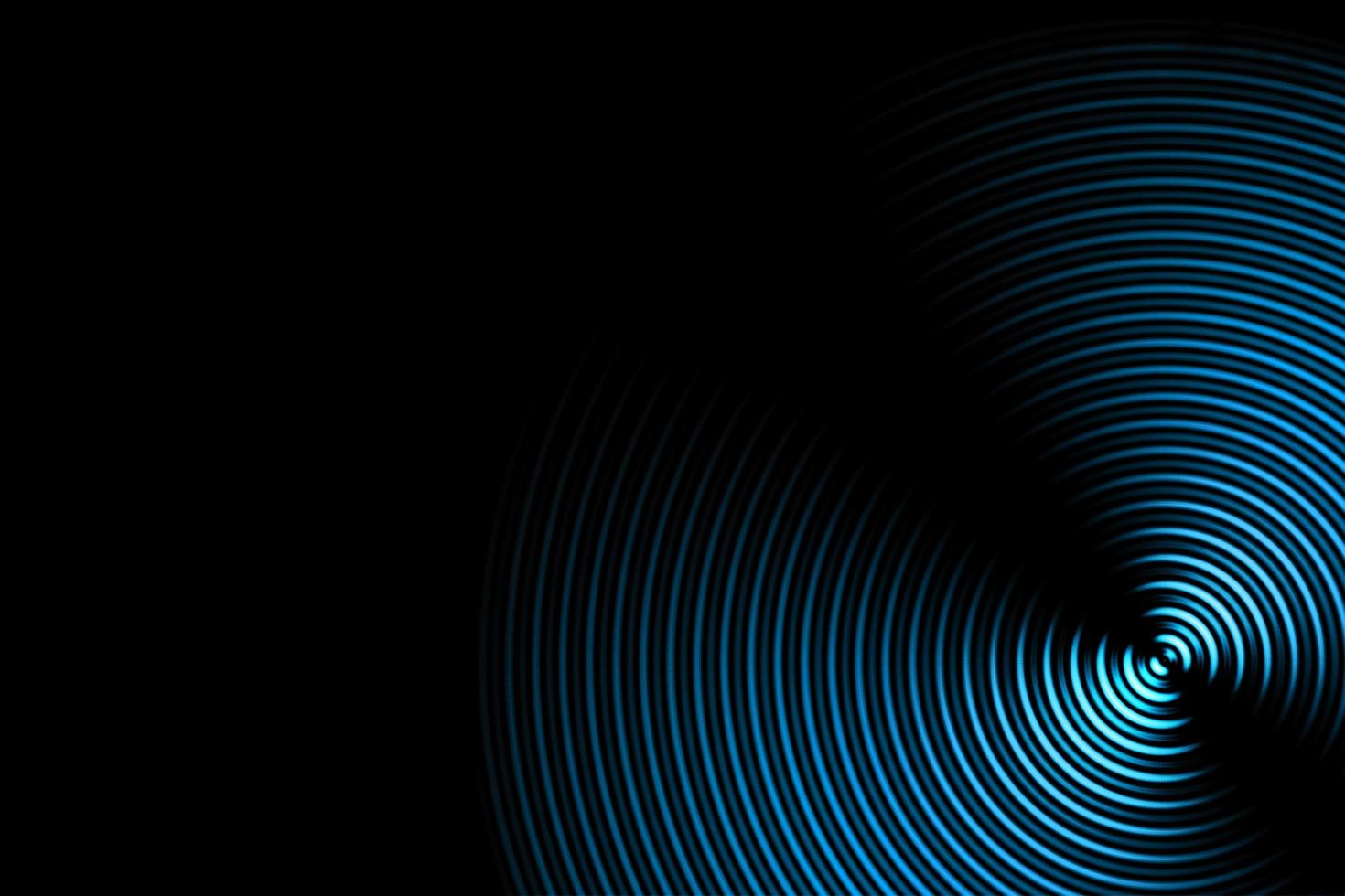 Abstract light blue signal effect with sound waves oscillating on black background photo