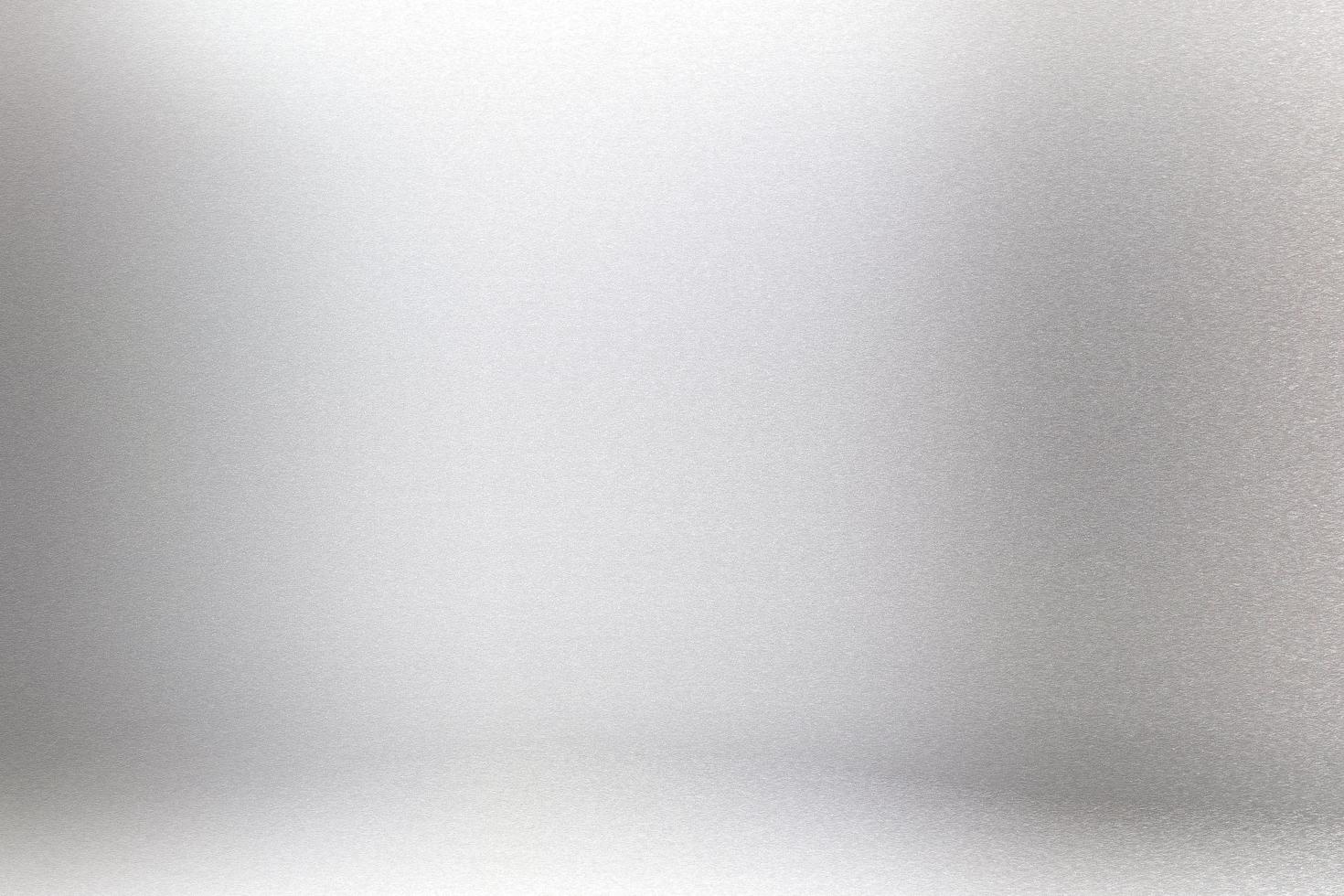 Glowing gray silver paper wall with copy space, abstract texture background photo