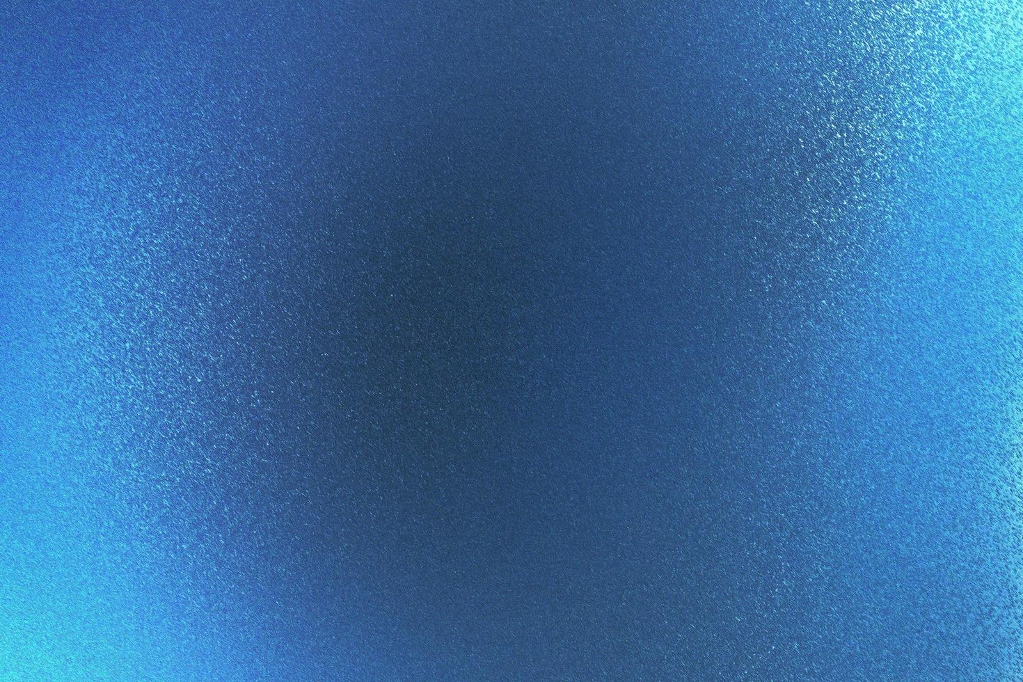 Shiny rough blue metal wall, abstract texture background photo