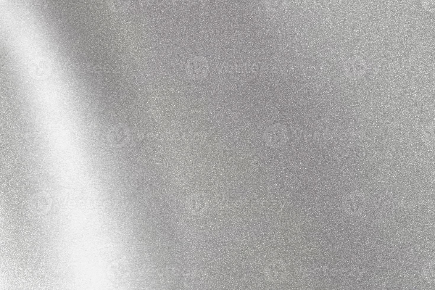 Abstract texture background, light shining on wave silver metal sheet photo