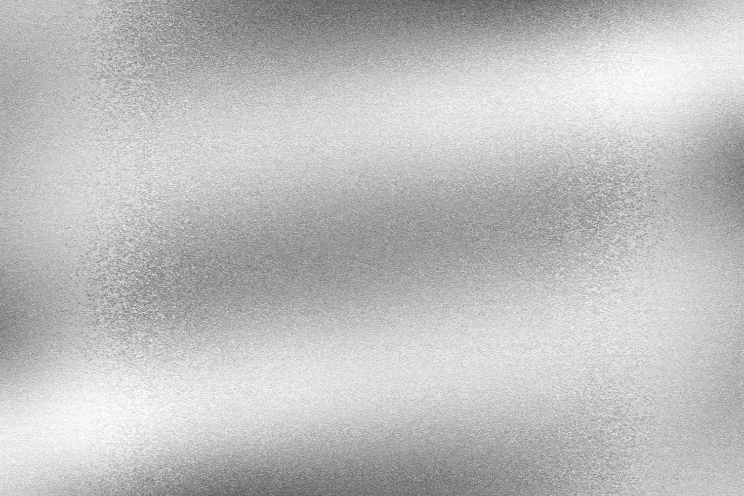 Light shining on wave metal sheet, abstract texture background photo