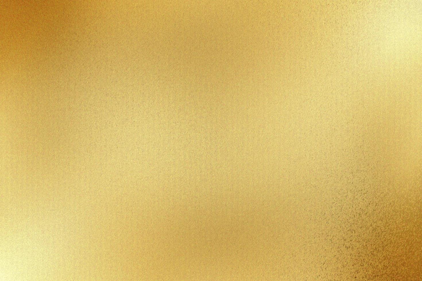 Polished gold steel sheet, abstract texture background photo