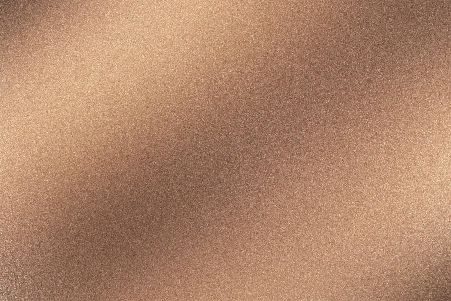 Abstract texture background, light shining on rough bronze metal wall photo