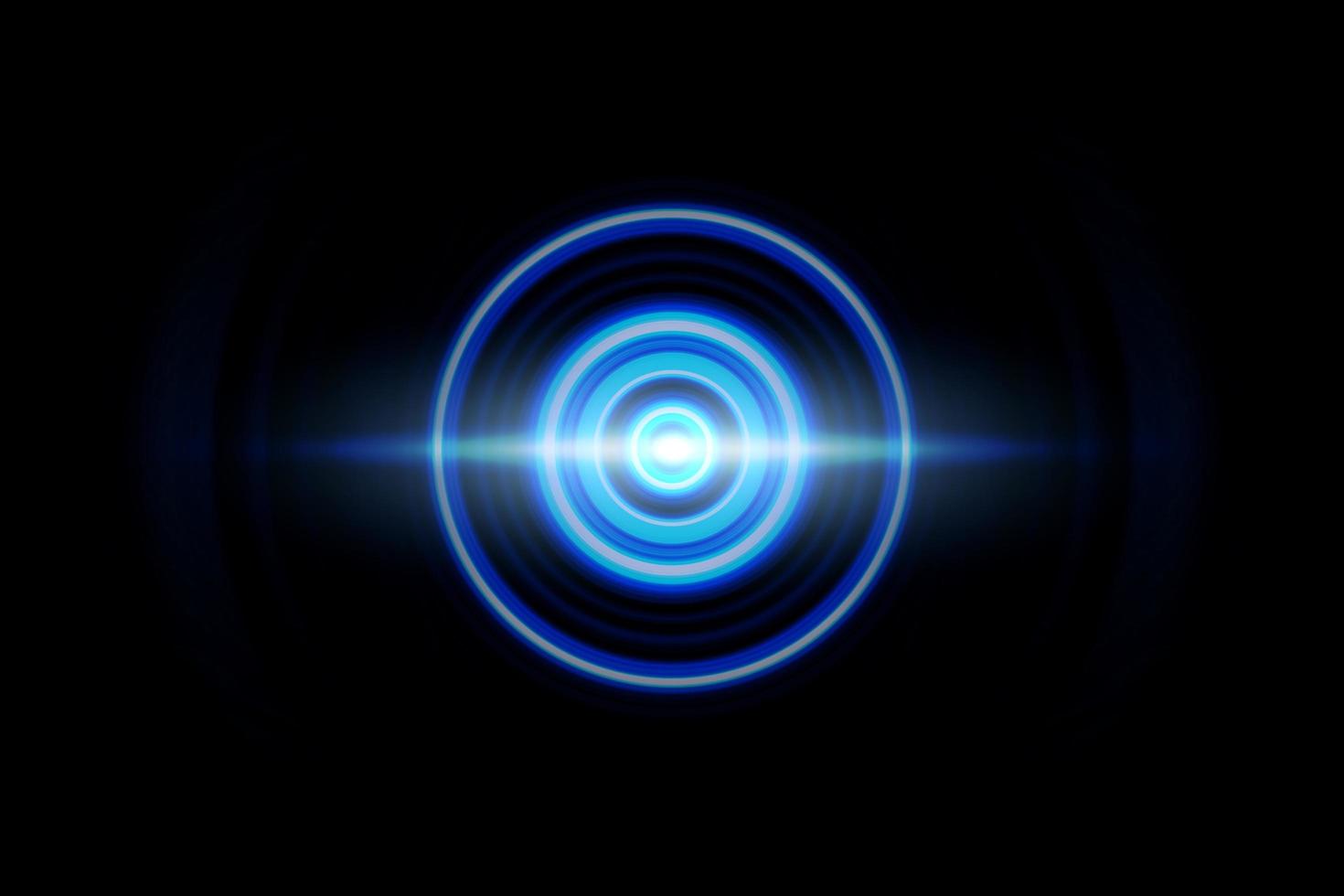 Abstract light effect with sound waves oscillating on black background photo