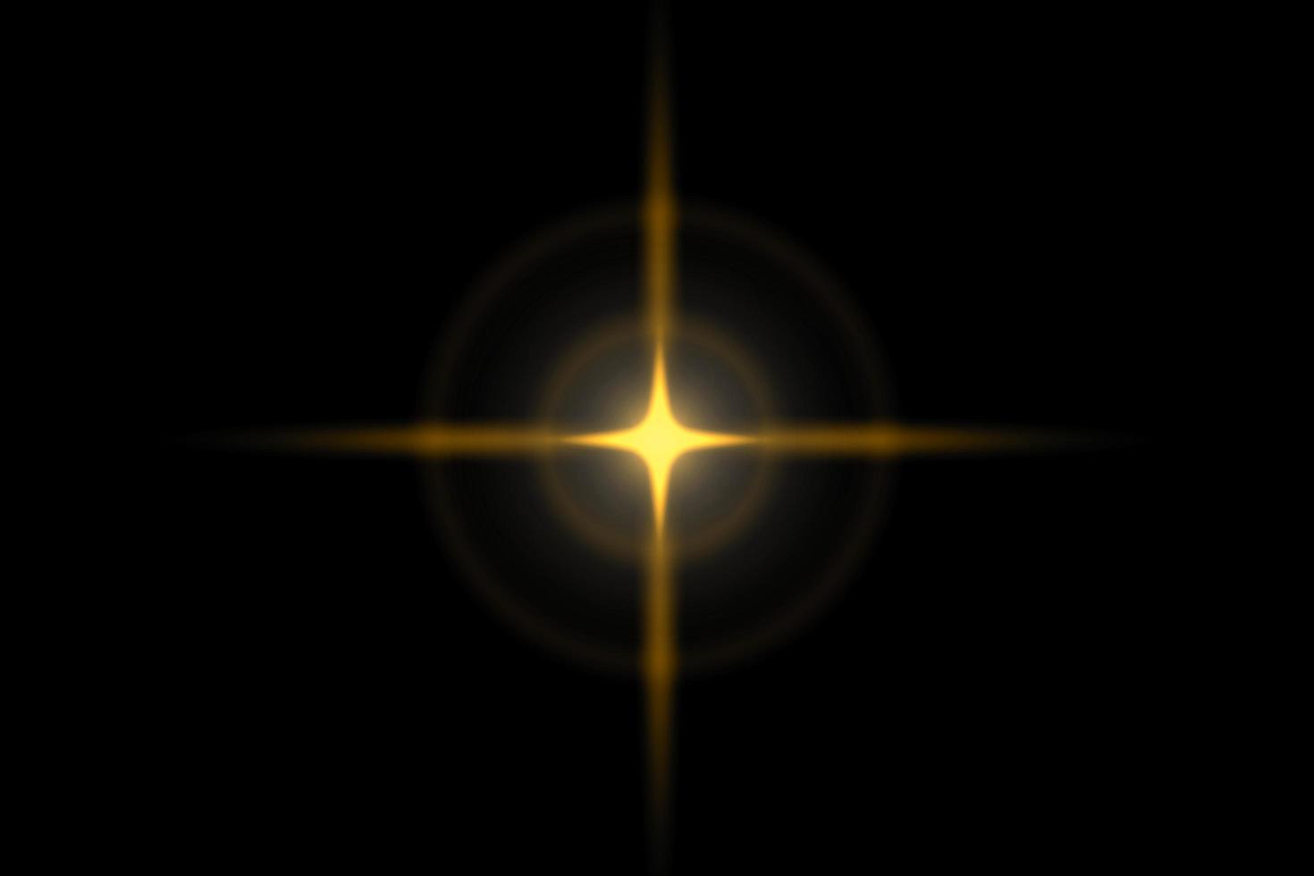 estrella láser dorada abstracta con efecto de luz sobre fondo negro foto