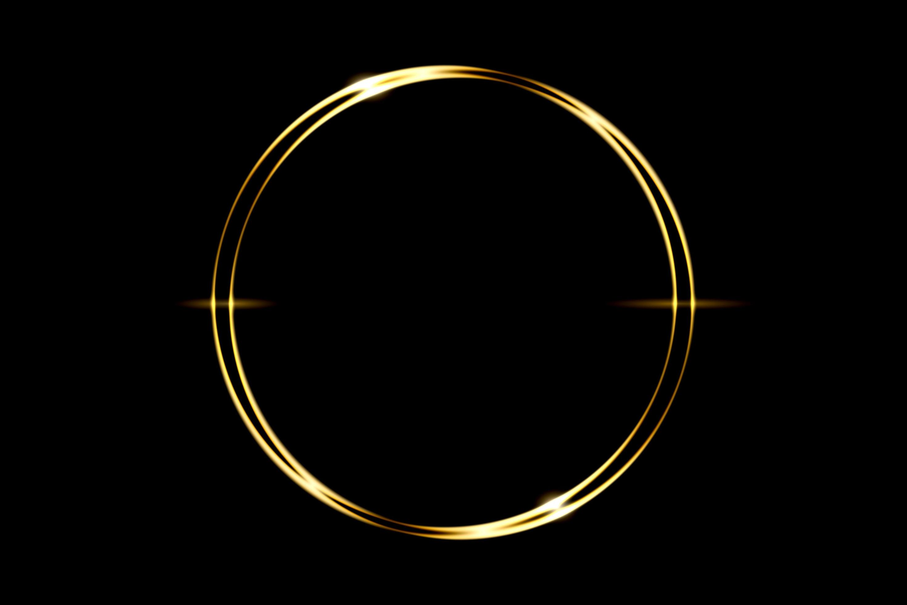 Glowing gold circle ring with light effect on black backdrop, abstract