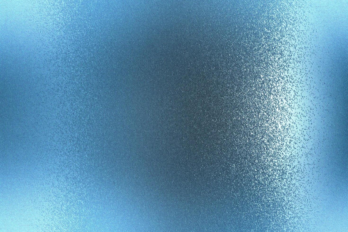 Shiny brushed blue metallic plate, abstract texture background photo