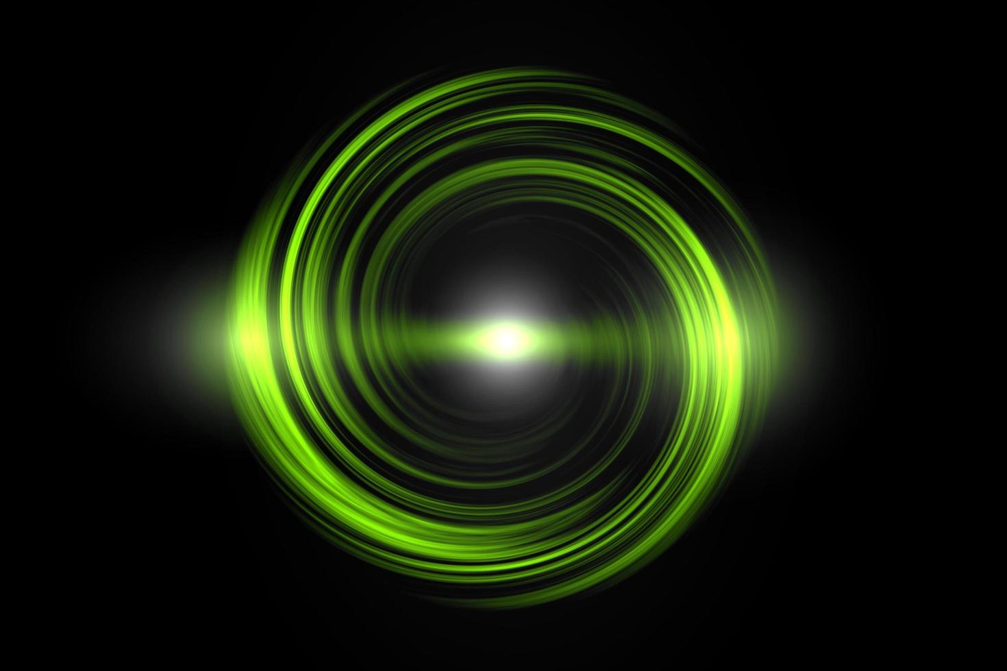 Glowing green spiral with light circle on black sky backdrop, abstract background photo