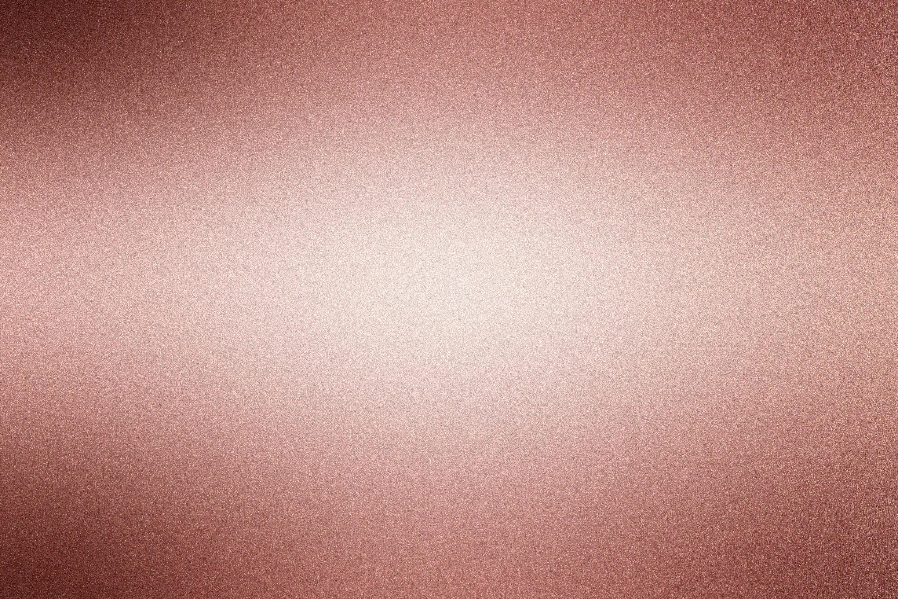 Rose gold foil metallic wall with copy space, abstract texture