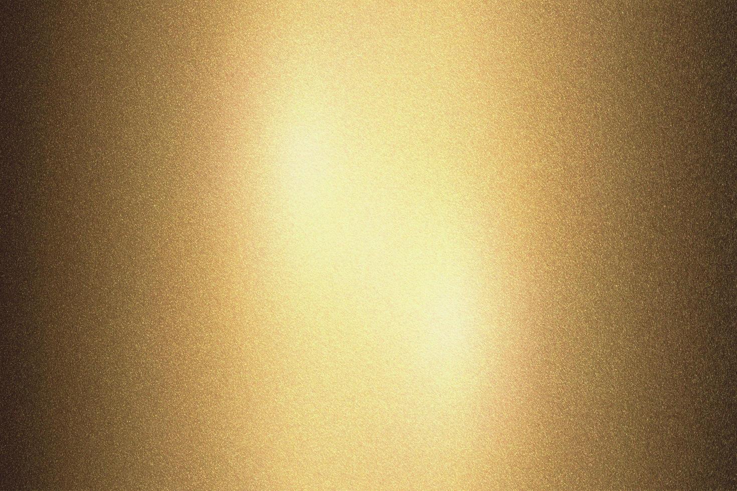 Abstract texture background, light shining on golden rough metal photo