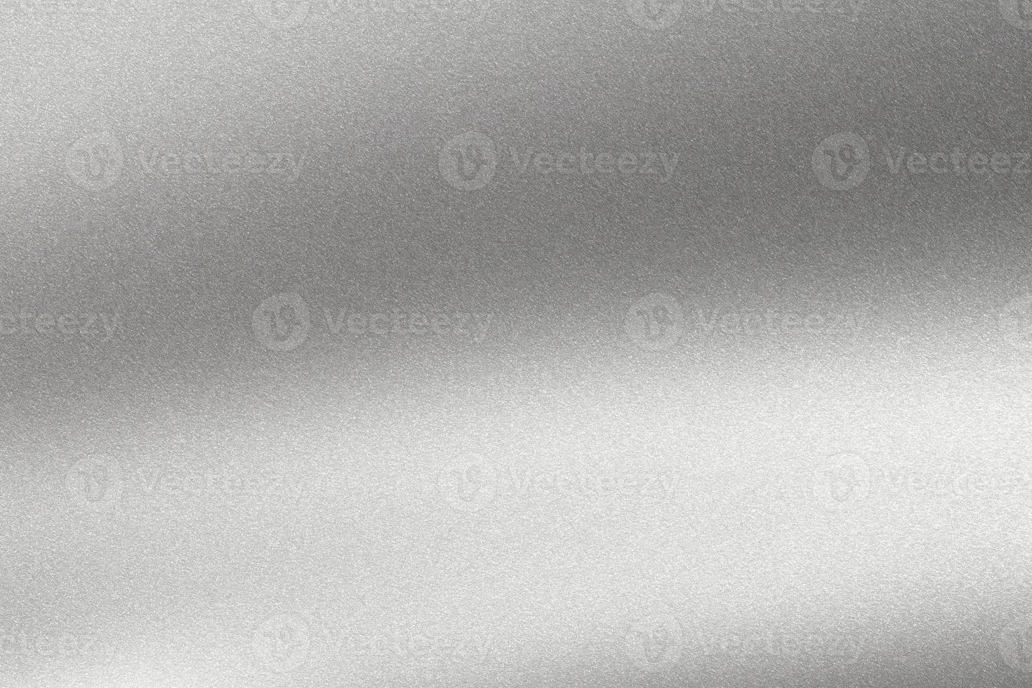 Abstract texture background, light shining on rough silver metal wall photo