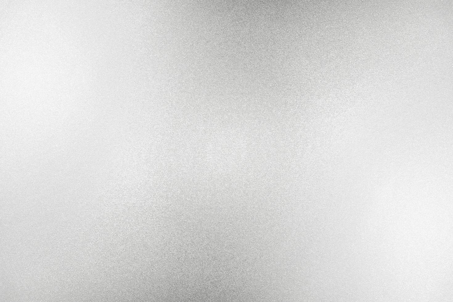 Glowing white silver glitter paper wall with copy space, abstract texture background photo