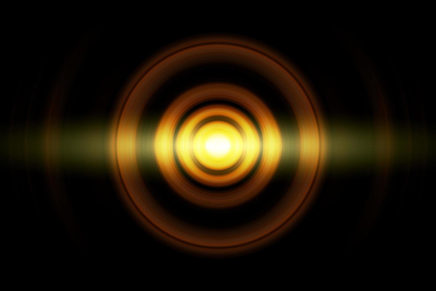 Abstract glowing circle orange light effect with sound waves oscillating background photo