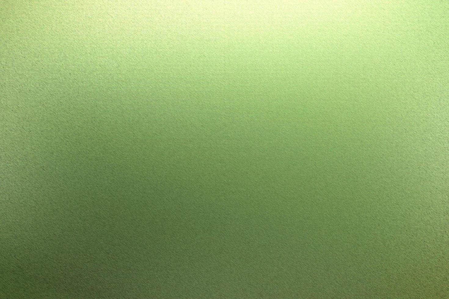 Brushed green metallic wall with scratched surface, abstract texture background photo