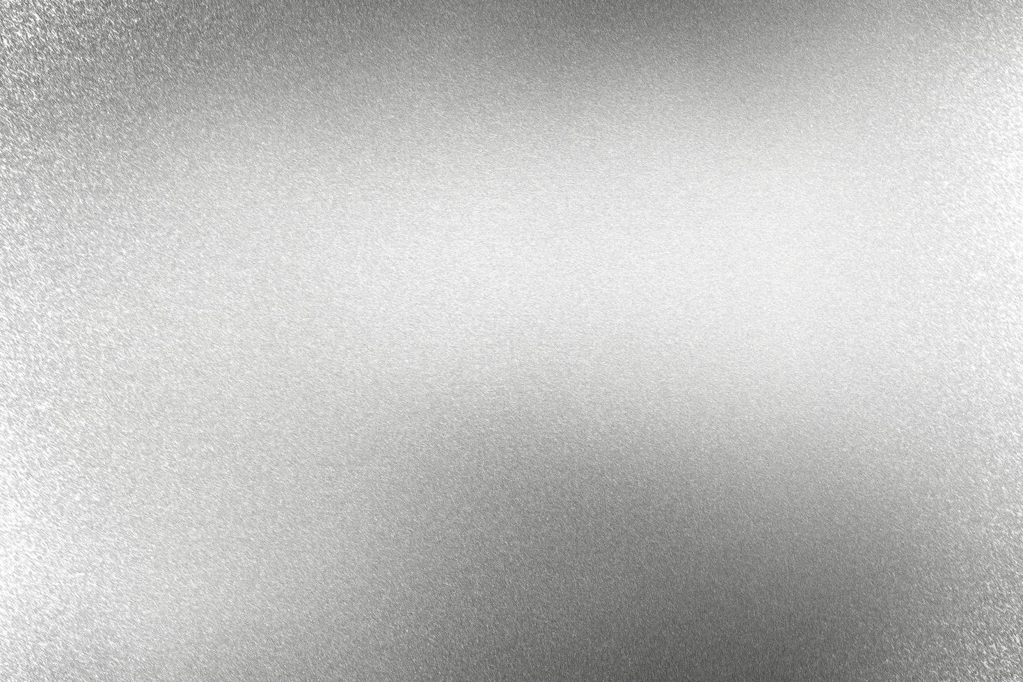 Scratches on silver metallic panel, abstract texture background photo