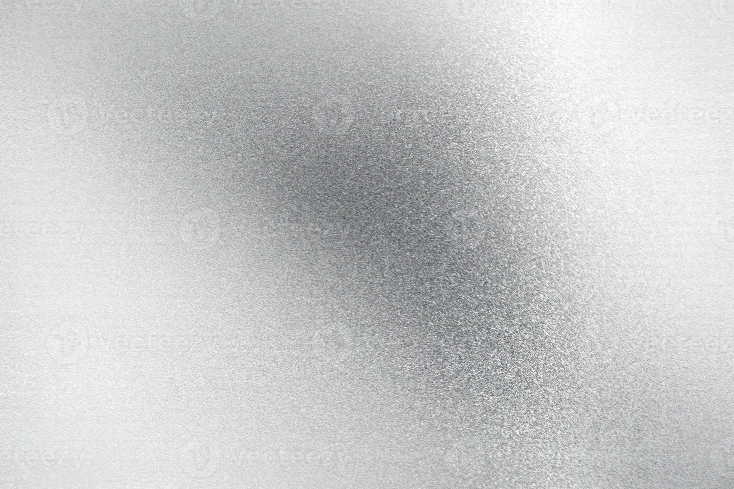 Shiny brushed silver metallic plate, abstract texture background photo