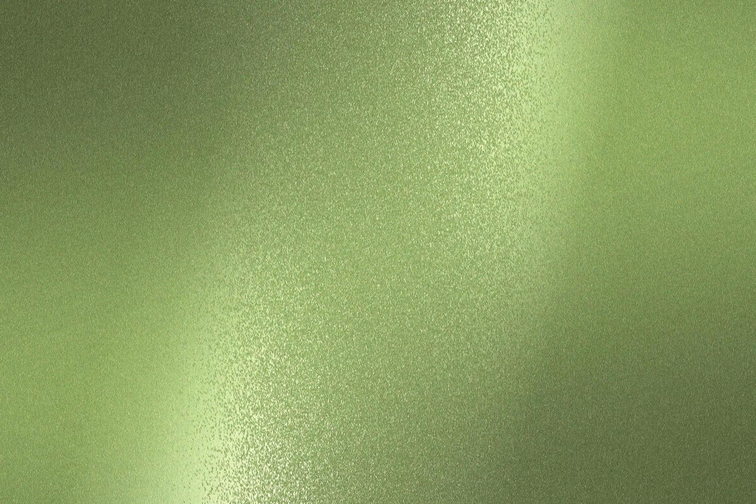 Reflection on rough light green metallic sheet surfaces, abstract texture background photo