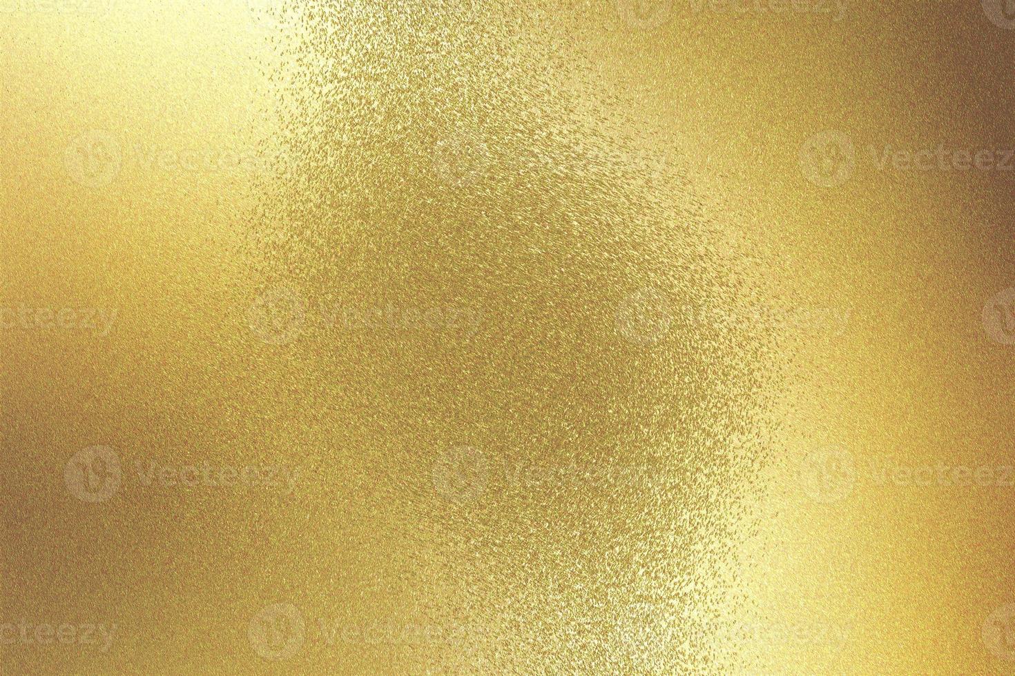 Glowing gold steel wall texture, abstract background photo
